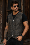Male model wearing a vintage brown leather biker vest featuring distressed leather, side lace panels, snap-button closure, and rugged motorcycle style.