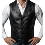 Front view of men's black genuine leather vest featuring a button-front closure, notch lapel collar, tailored fit, and classic waistcoat styling worn over a white dress shirt.