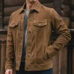 Men's brown suede leather trucker jacket featuring a button-front closure, flap chest pockets, classic shirt collar, and vintage Western-inspired design with a soft suede finish.