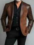 Man wearing a brown genuine leather blazer jacket with a tailored single-breasted design, notch lapel collar, contrasting leather panels, and front pockets.